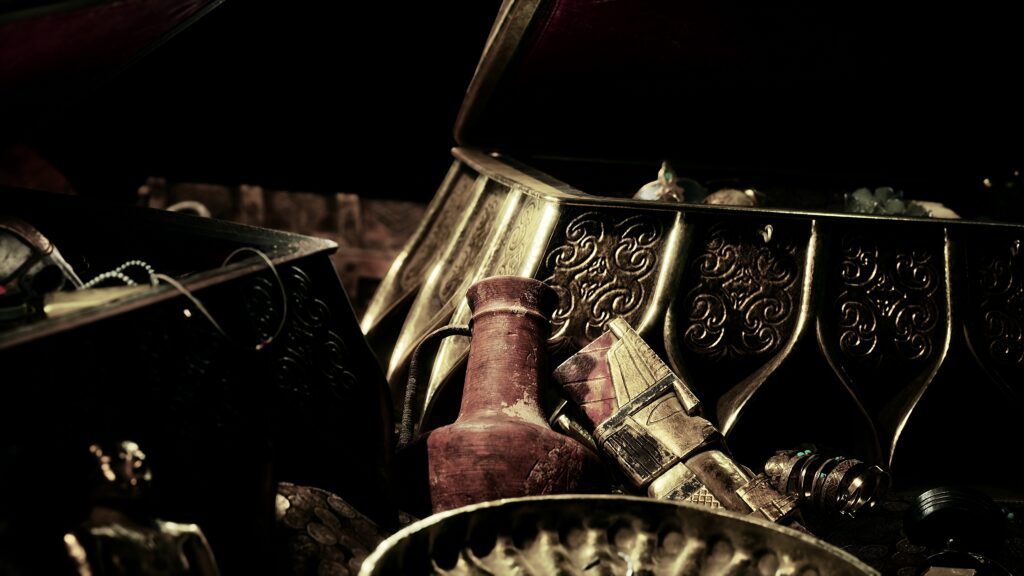 Jewels and gold coins arranged in low light